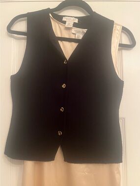 Rache Zoe cream long Satin dress with black vest and gold buttons